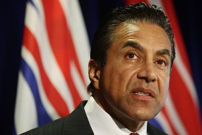 Former B.C. cabinet minister denies saying government knew about casino crime